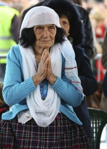 An Albanian woman prays during the mass at the cathedral in the northern city of Shkoder, Albania, celebrating the beatification of 38 Catholic martyrs executed or tortured to death during the former communist regime Saturday, Nov. 5, 2016. Albanians celebrated their beatification after Pope Francis had officially recognized as martyrs Archbishop Vincens Prenushi and 37 other priests who died in prison or were murdered in 1945-1974 by the late communist dictator Enver Hoxha's regime. (AP Photo/Hektor Pustina)