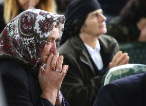 An Albanian woman prays during the mass at the cathedral in the northern city of Shkoder, Albania, celebrating the beatification of 38 Catholic martyrs executed or tortured to death during the former communist regime Saturday, Nov. 5, 2016. Albanians celebrated their beatification after Pope Francis had officially recognized as martyrs Archbishop Vincens Prenushi and 37 other priests who died in prison or were murdered in 1945-1974 by the late communist dictator Enver Hoxha's regime. (AP Photo/Hektor Pustina)