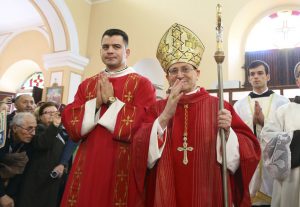 Cardinal Angelo Amato, the pope's representative, enters the cathedral in the northern city of Shkoder, Albania, which celebrated the beatification of 38 Catholic martyrs executed or tortured to death during the former communist regime Saturday, Nov. 5, 2016. Albanians celebrated their beatification after Pope Francis had officially recognized as martyrs Archbishop Vincens Prenushi and 37 other priests who died in prison or were murdered in 1945-1974 by the late communist dictator Enver Hoxha's regime. (AP Photo/Hektor Pustina)