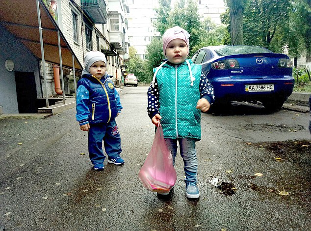 Little Daniil (left) who starved to death with his big sister Anna