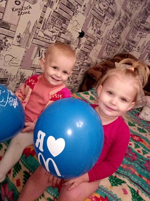 Little Daniil (left) with sister Anna